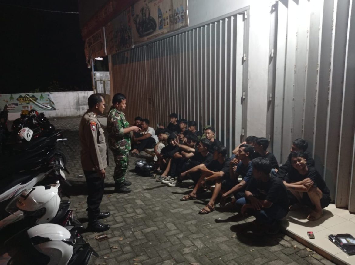 Sinergitas Bhabinkamtibmas Dan Babinsa Ciptakan Situasi Di Kota Metro Tetap Kondusif