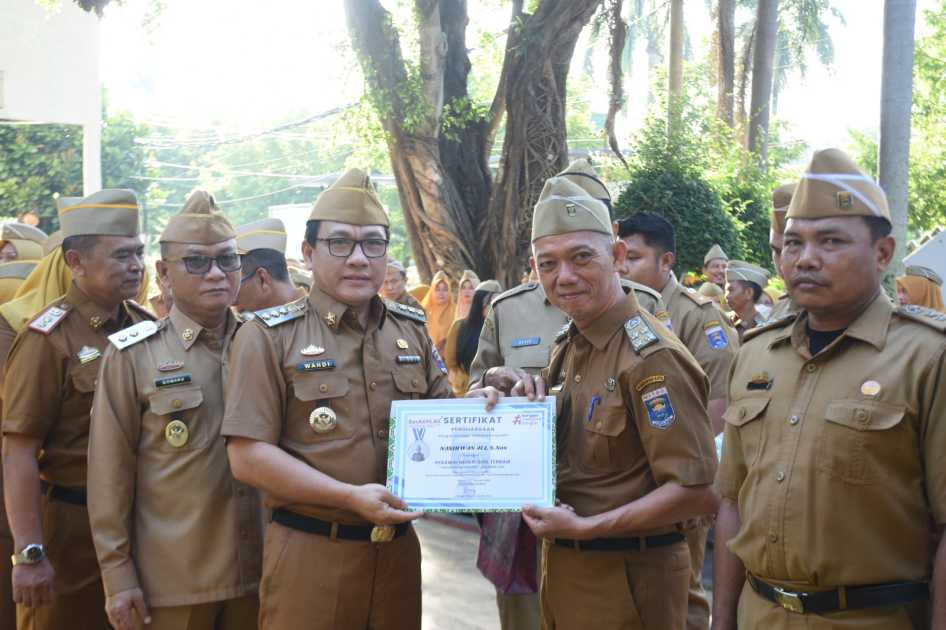 Dengan Nilai 97,21, Pemerintah Kota Metro Raih Penghargaan Predikat Kepatuhan Tertinggi Penyelenggaraan Pelayanan Publik